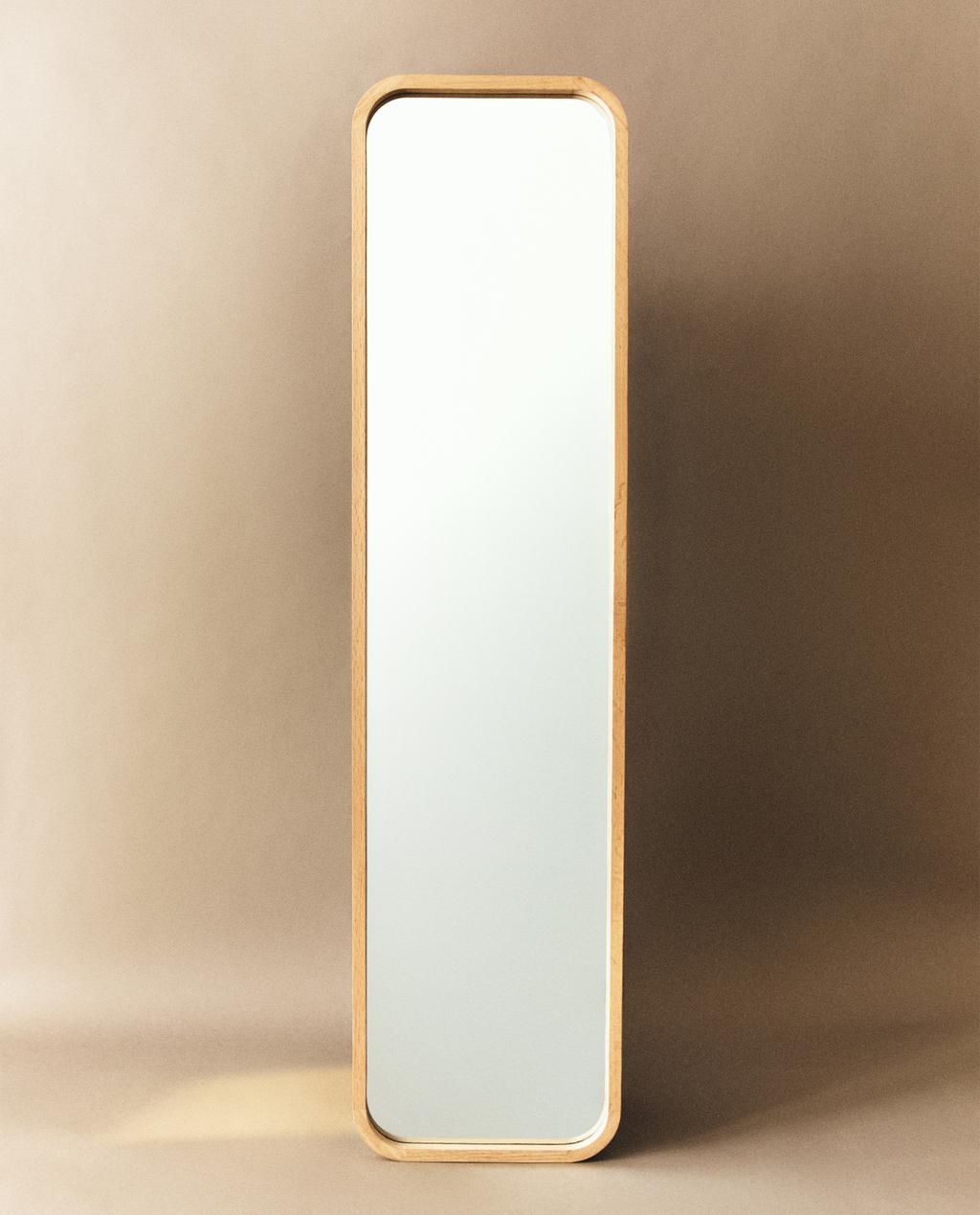 ROUND VERTICAL MIRROR WITH FRAME