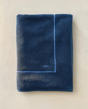 PESHQIR PLAZHI ME BORDURË TË THJESHTË