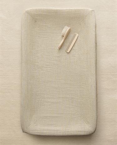 غلاف بساط تغيير حفاظات الرضّع موسلين مخطط