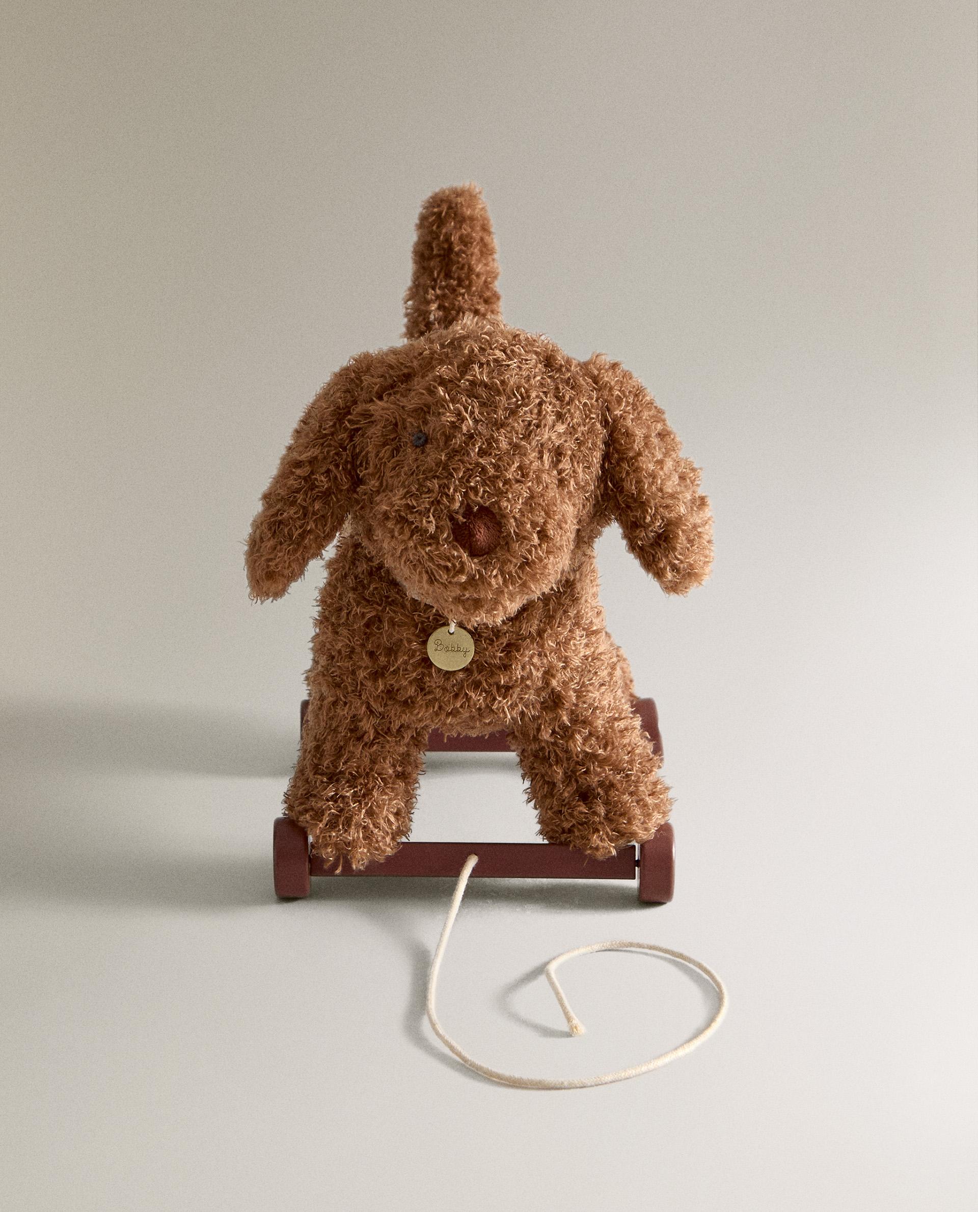Chien à roulettes en peluche ancien - Collection Chien à roulettes en peluche ancien - Collection