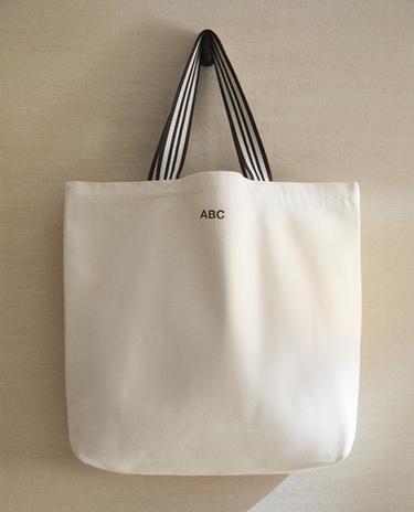 حقيبة قماش مخططة بوجهين