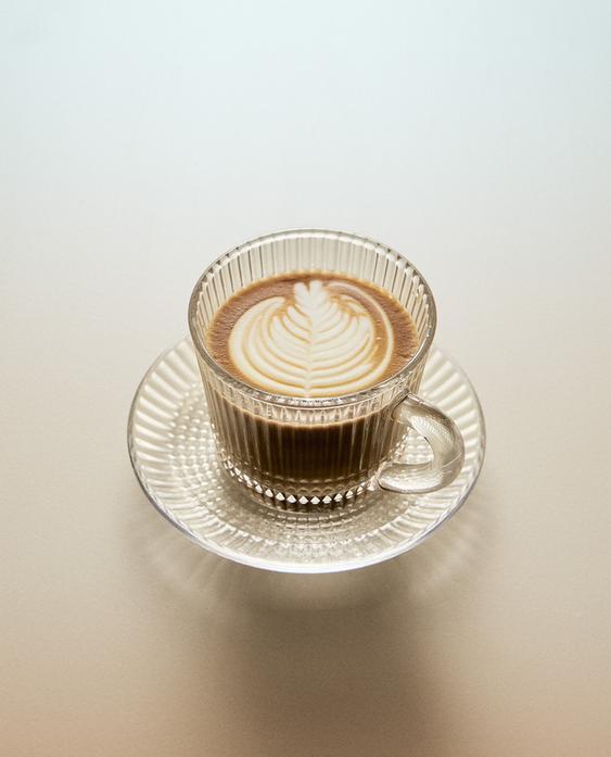 GLASS COFFEE CUP AND SAUCER WITH RAISED GEOMETRIC DESIGN GLASS COFFEE CUP AND SAUCER WITH RAISED GEOMETRIC DESIGN