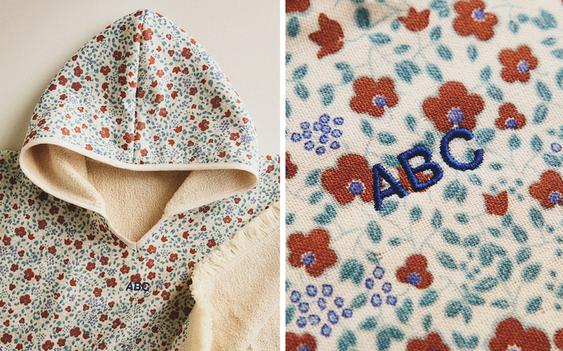 BLOMMIG STRANDPONCHO FÖR BARN